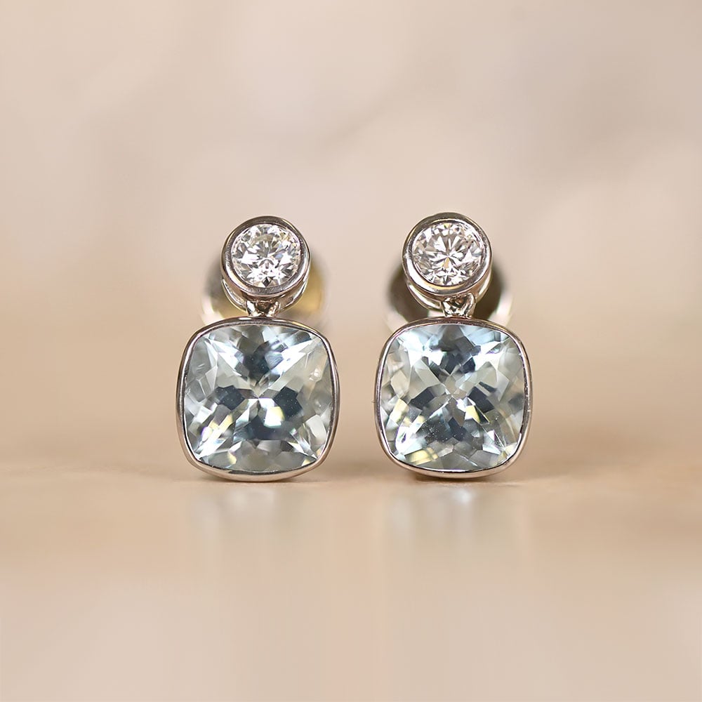 Aquamarine Estate Diamond Earrings on pink bg