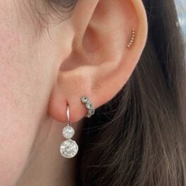 Esmont Earrings featuring a bezel-set old European cut diamonds