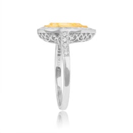 diamond baguette halo with natural fancy yellow pear shaped diamond Tyrone ring