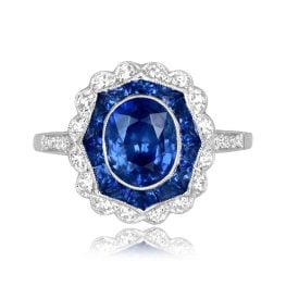 center 1.69 carat oval cut sapphire with double halo Cammoro Ring 16137