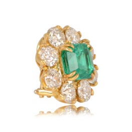 5.54 carats emerald earrings with diamonds around the stone